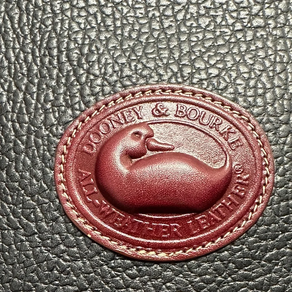 Dooney & Bourke Black Leather Bag with Red Logo
